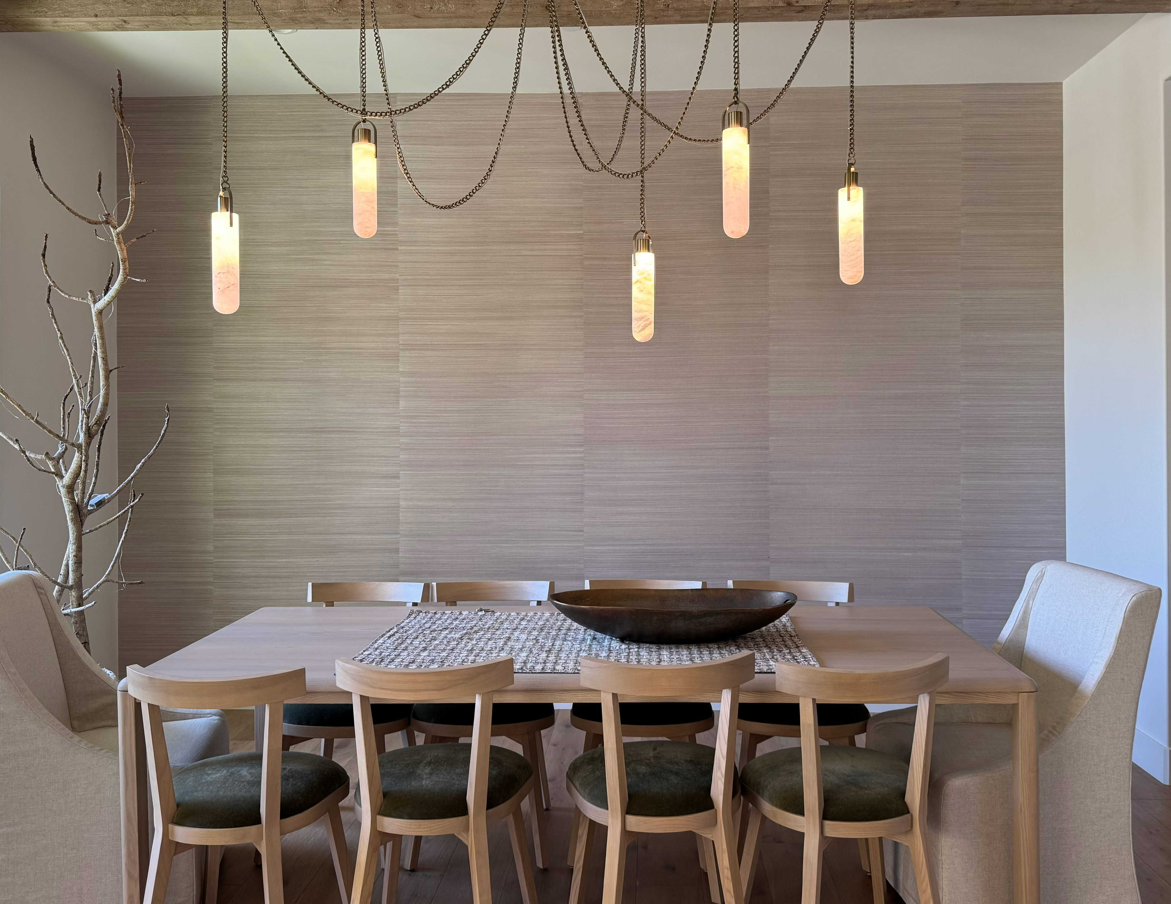 Symmetrical grasscloth accent wall with balanced panel layout